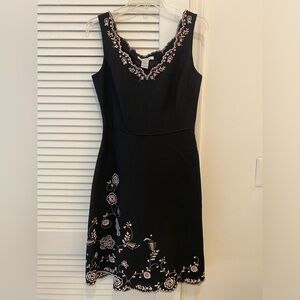 Paraphrase sleeveless dress, black with light pink embroidery edges. Size 4.